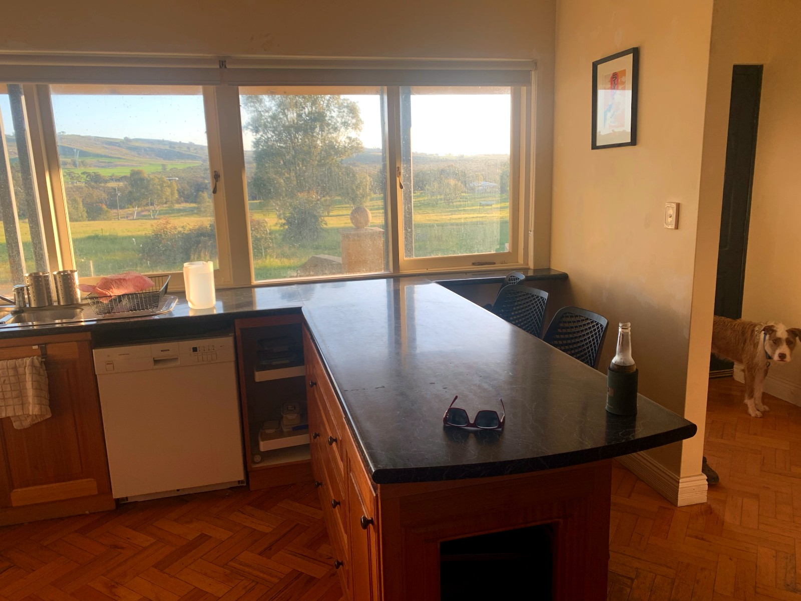Kitchen before renovation, timber island bench and parquet floor